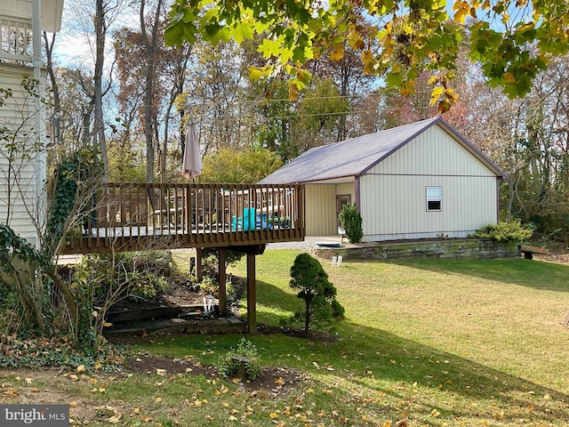 view of yard featuring a wooden deck