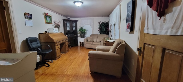 office area with light hardwood / wood-style floors