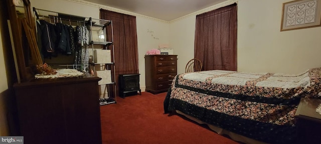 carpeted bedroom with crown molding