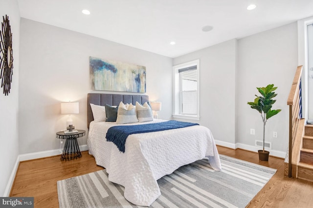 bedroom featuring hardwood / wood-style flooring