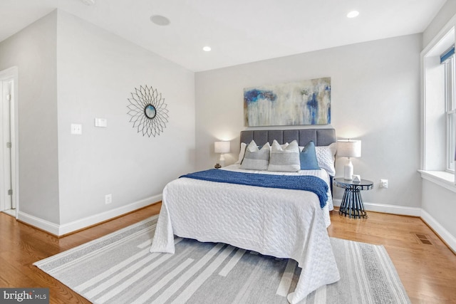 bedroom featuring hardwood / wood-style floors