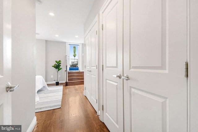 hallway featuring hardwood / wood-style floors