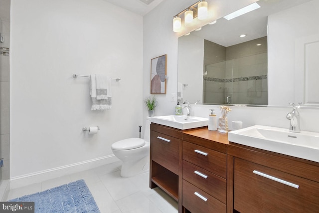 bathroom with toilet, tile patterned flooring, a shower with shower door, and vanity