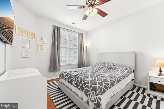 bedroom featuring ceiling fan