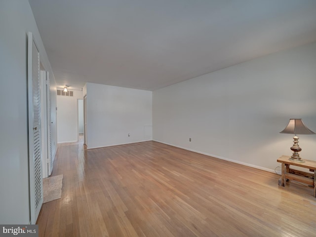 unfurnished living room featuring light wood-type flooring