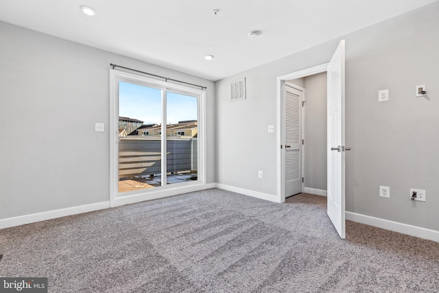 unfurnished bedroom featuring carpet flooring