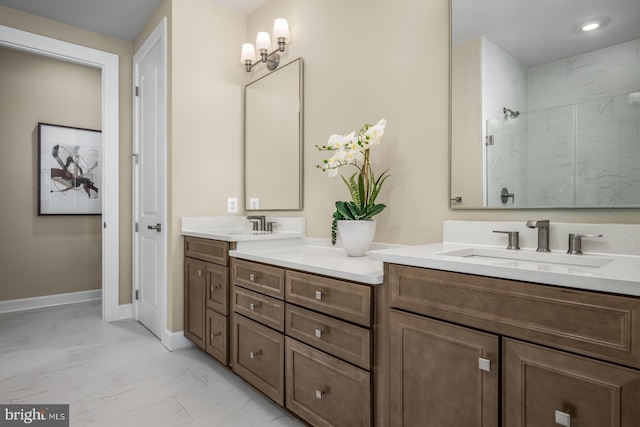 bathroom featuring a shower and vanity