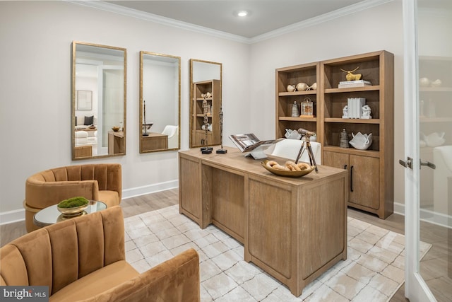 office featuring light wood-type flooring and crown molding