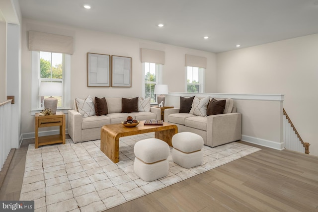 living room with light hardwood / wood-style flooring