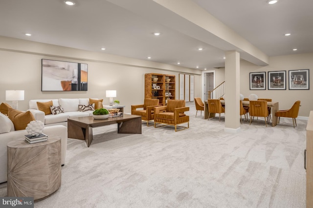 living room featuring light colored carpet