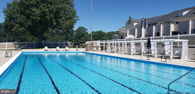 view of pool with a pergola