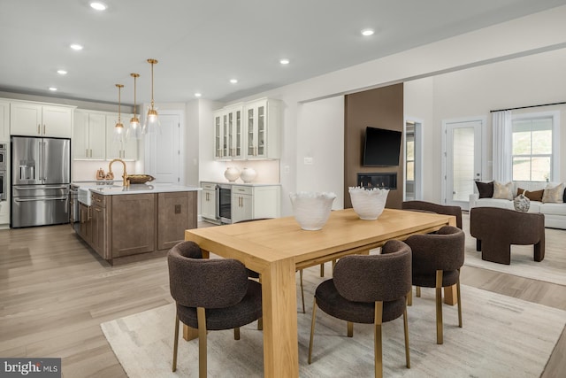 dining area featuring light hardwood / wood-style floors