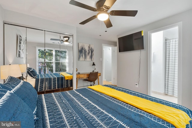 bedroom featuring ceiling fan and a closet