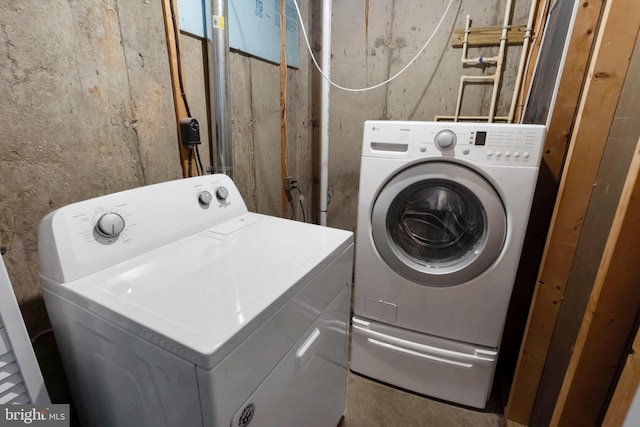 laundry area with washer and clothes dryer