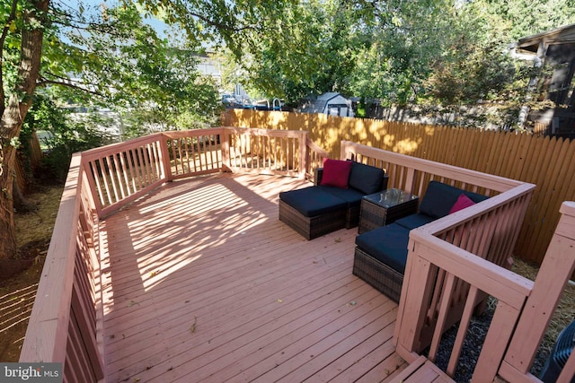 deck with an outdoor living space