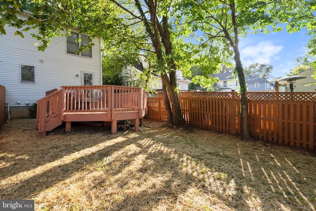 view of yard featuring a deck