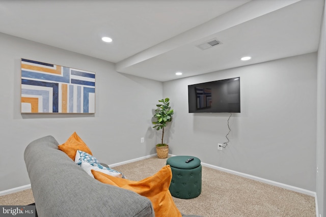 sitting room featuring carpet flooring