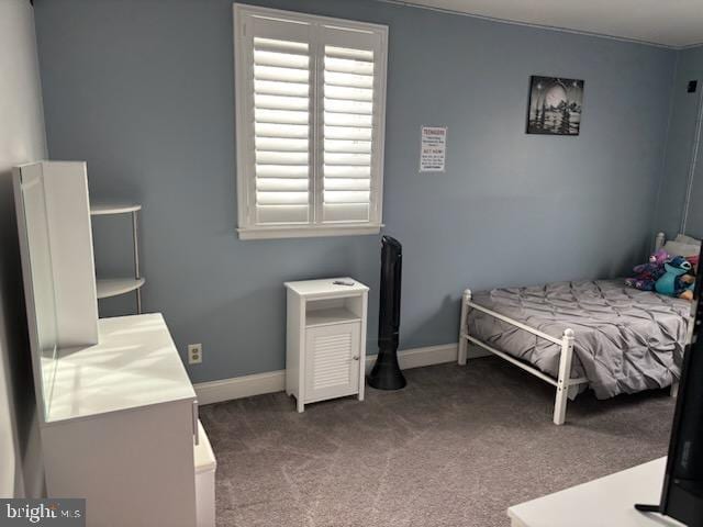 bedroom with light colored carpet