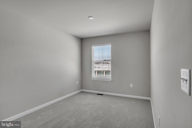 view of carpeted spare room