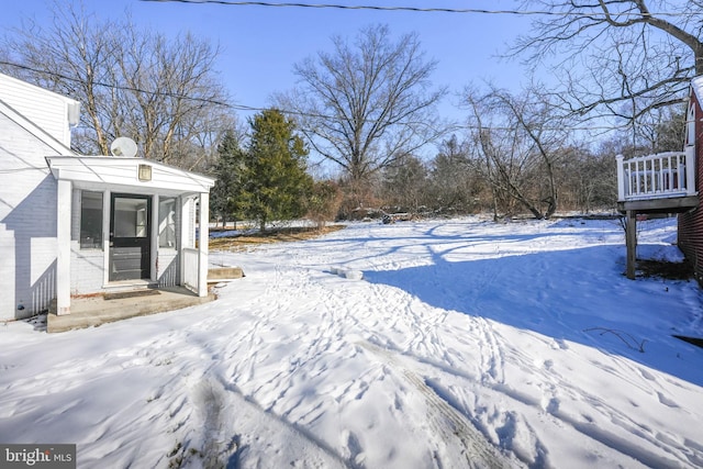 view of snowy yard