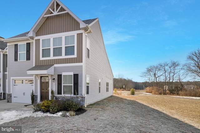 view of front of property with a garage