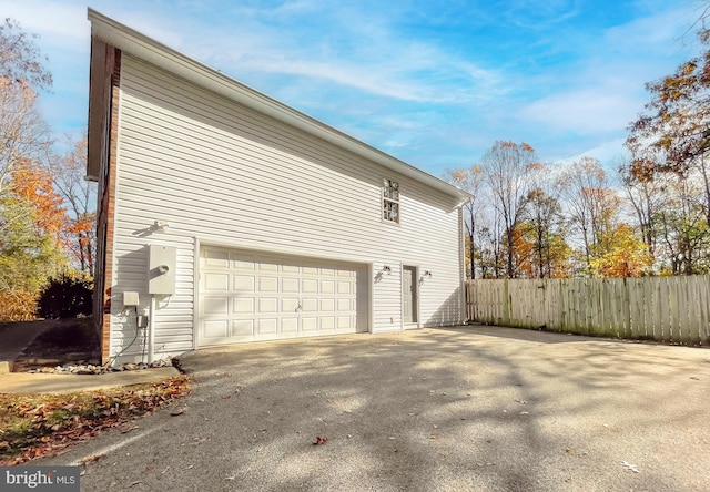 view of home's exterior with a garage