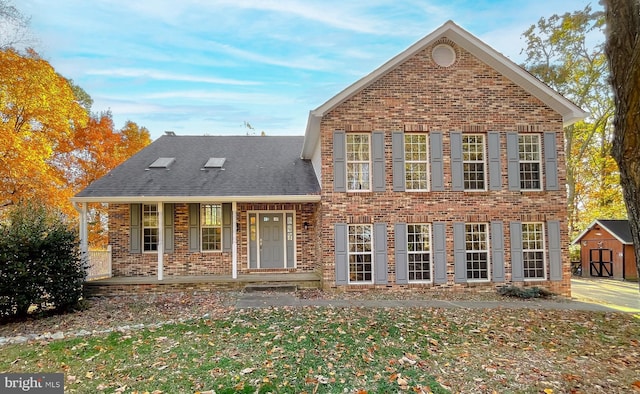 view of front property featuring covered porch