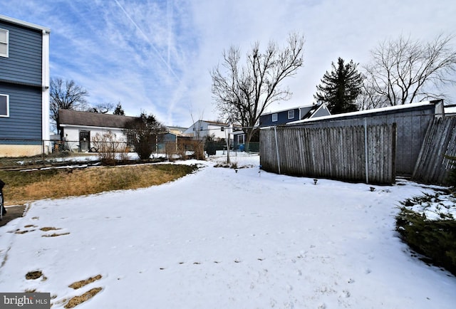 view of yard covered in snow