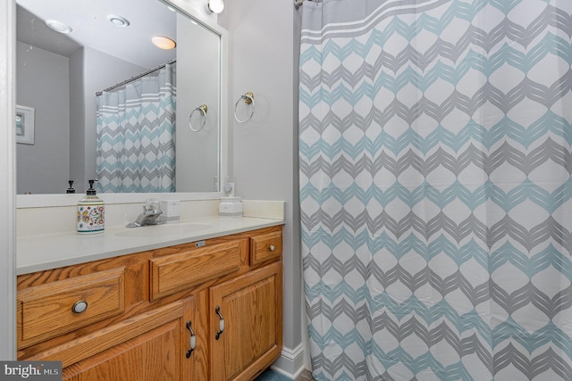 bathroom with vanity and a shower with curtain