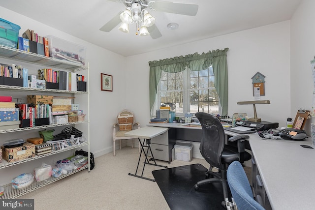 office space featuring light colored carpet and ceiling fan