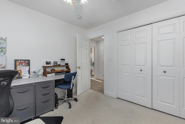 office area with light colored carpet