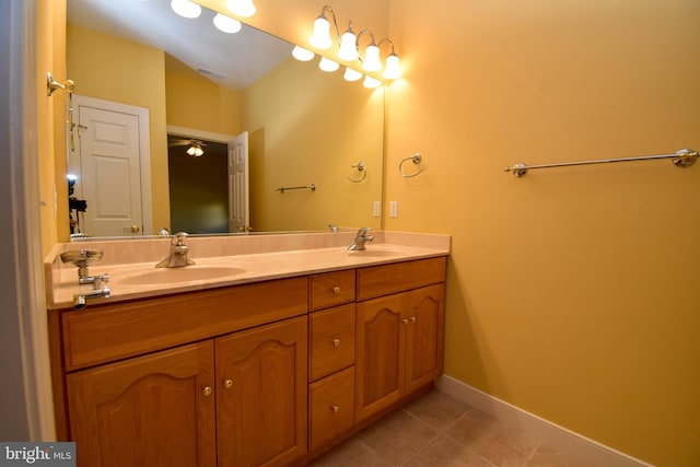 bathroom with vanity and tile patterned flooring