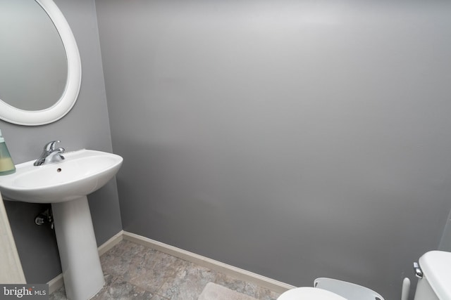 bathroom with sink and toilet