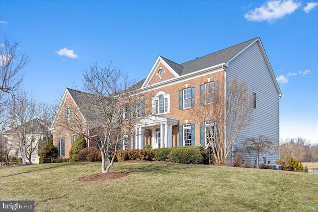 colonial house with a front lawn