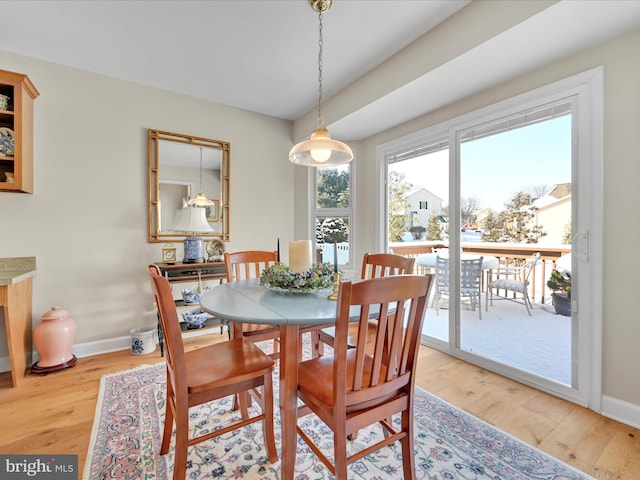 dining room with light wood-type flooring