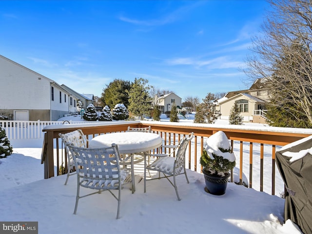 view of snow covered deck