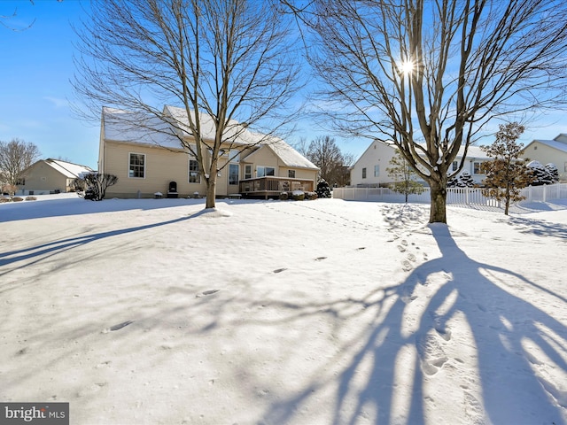 view of snow covered property