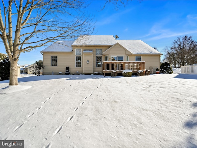 view of front of property with a wooden deck