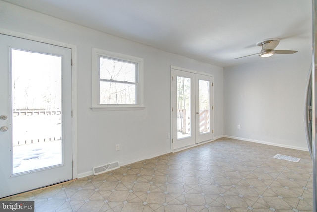 entryway featuring ceiling fan