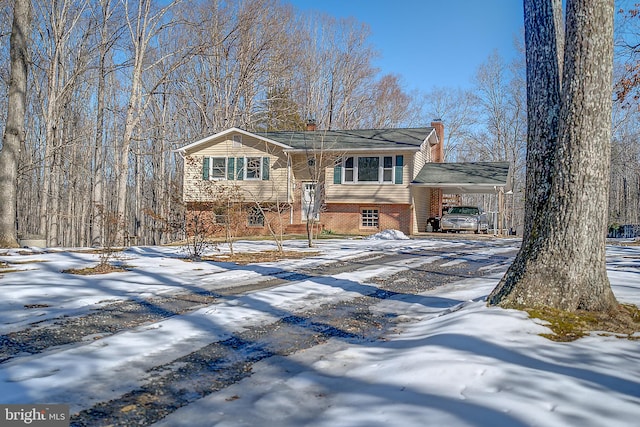 view of front of property with a carport