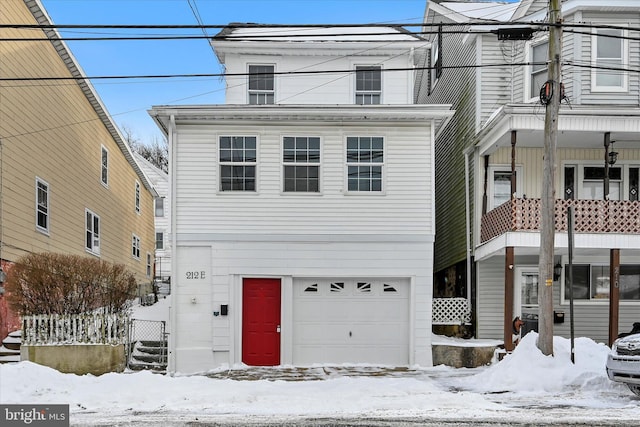 view of front of property with a garage