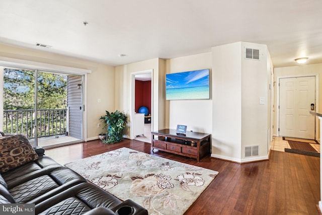 living room with dark wood-type flooring