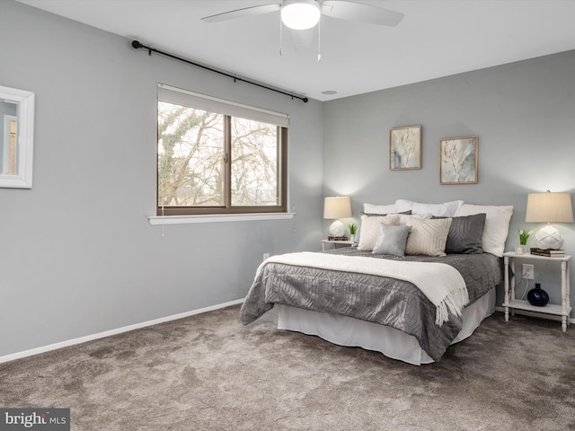 bedroom with ceiling fan and carpet