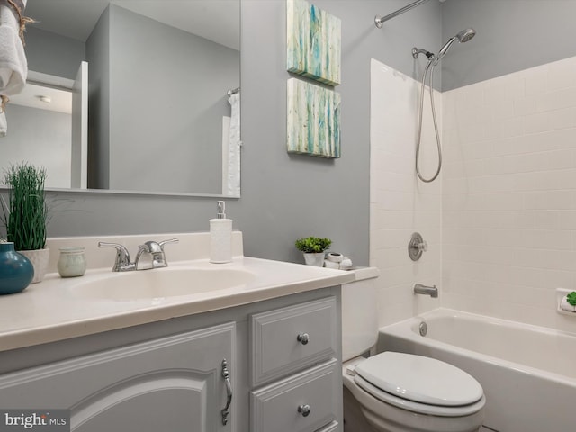 full bathroom with vanity, shower / washtub combination, and toilet