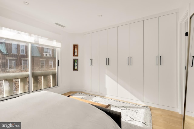 bedroom featuring light hardwood / wood-style flooring