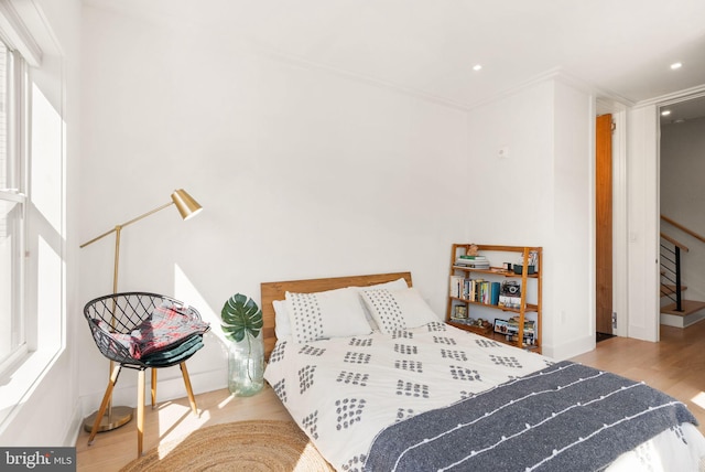 bedroom featuring light hardwood / wood-style flooring