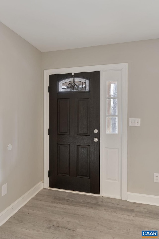 foyer entrance featuring light hardwood / wood-style flooring