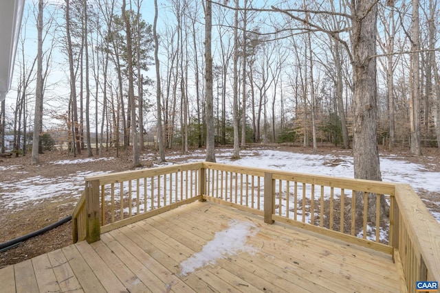 view of snow covered deck