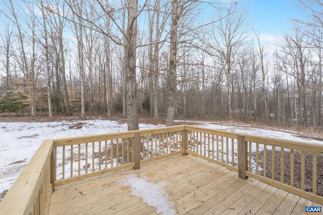 view of snow covered deck