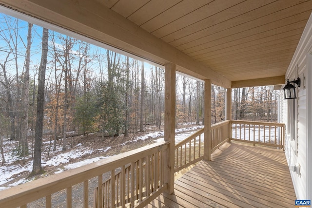 view of snow covered deck